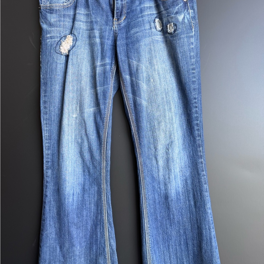 Vanity Blue Boot Cut Jeans with Distressed Details